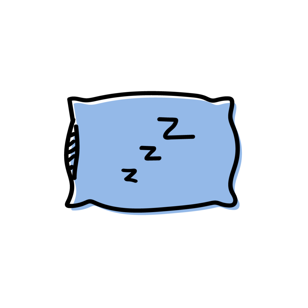 A blue pillow with the letters zzZ on it, suggesting bed or sleep